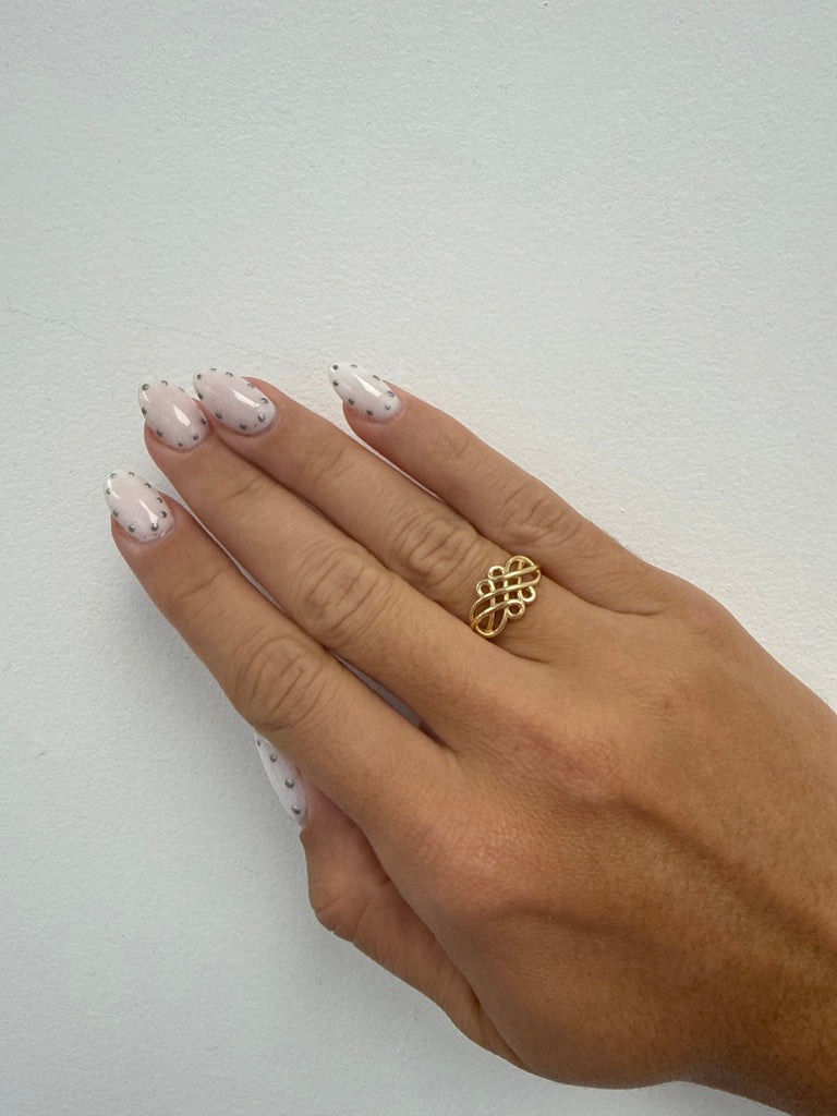 Anillo entrelezado 14k