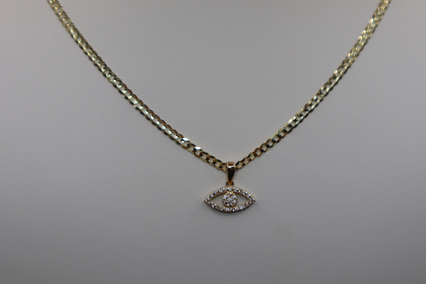Cadena cubana martillada con dije de ojo turco en oro 14k!!