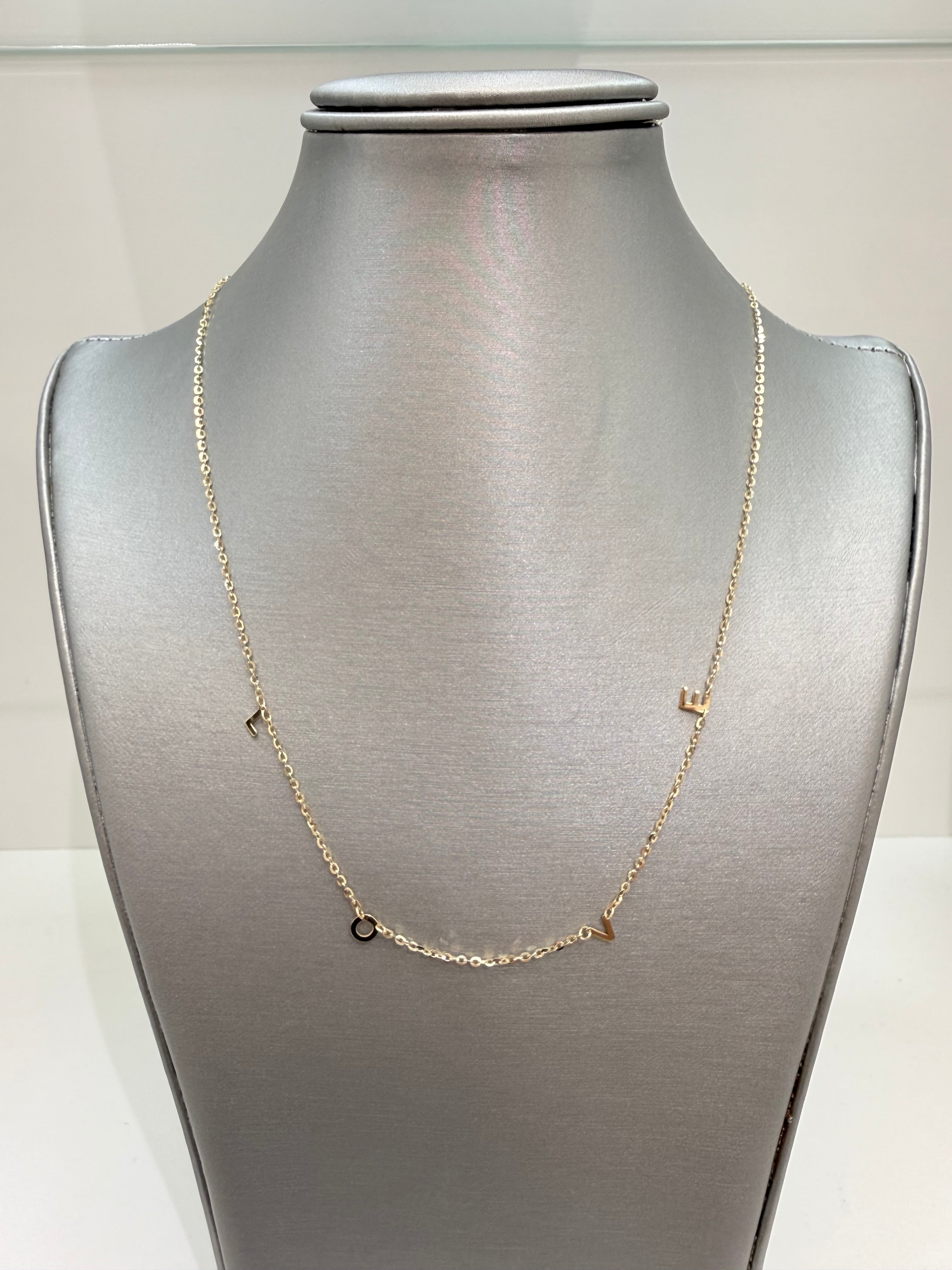 Cadena 14 kt con diseño de Love