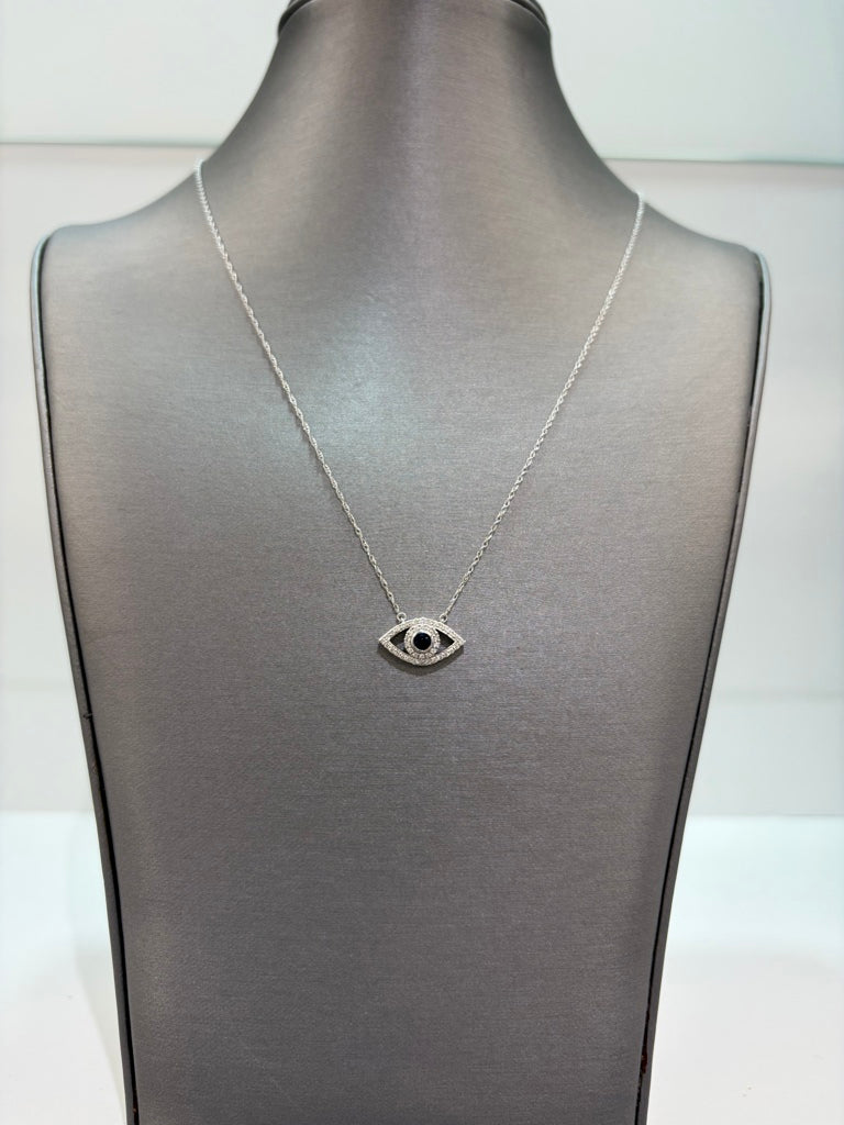 Cadena de oro blanco con ojo de circonias 14k