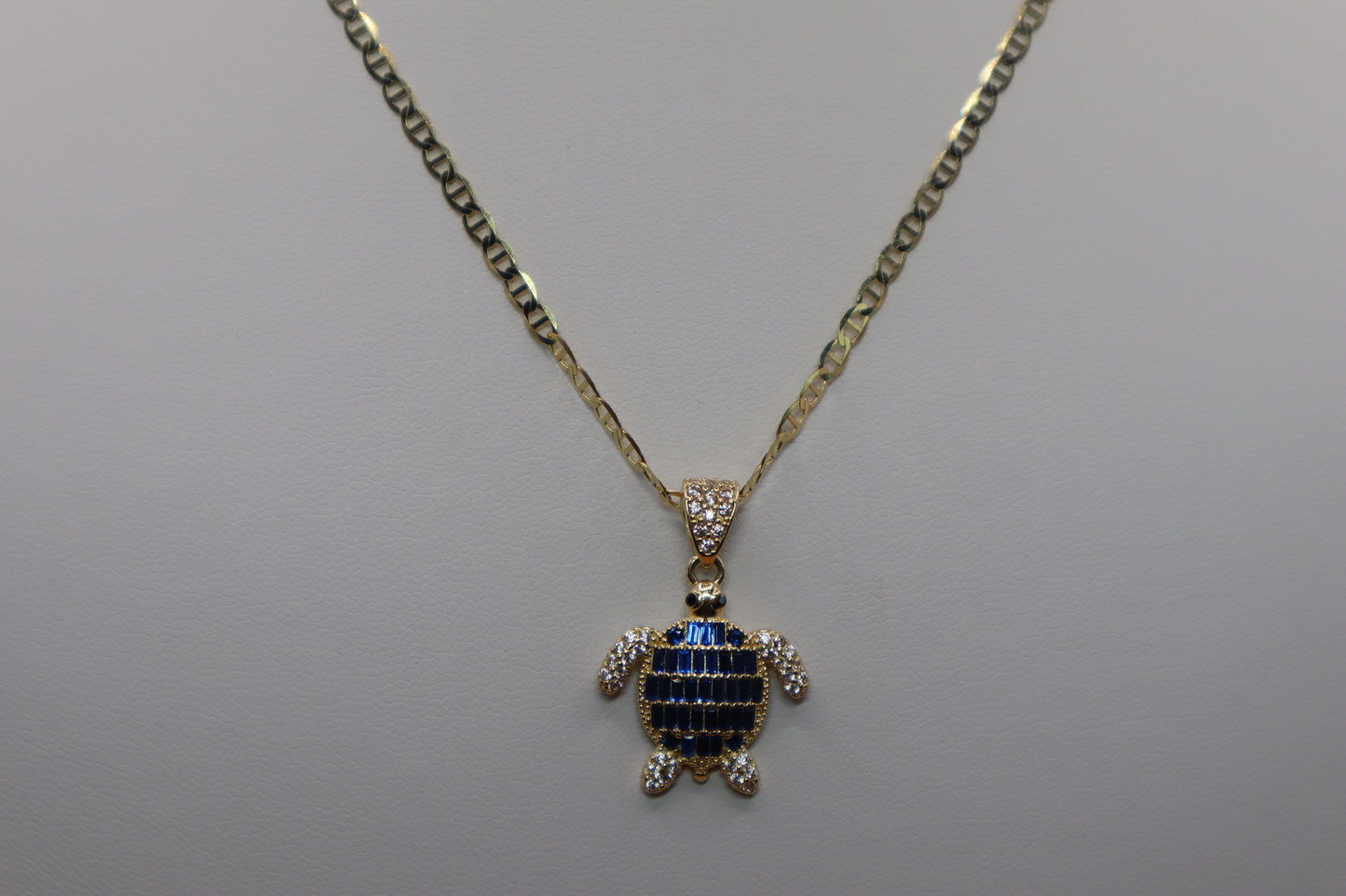 Cadena eslabón GG con dije de tortuga en oro 14 k!!