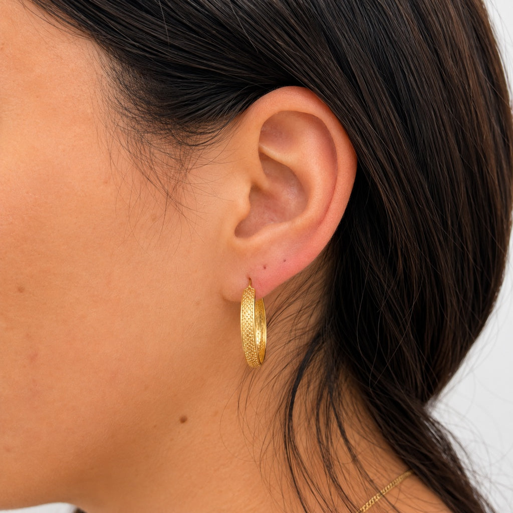 argollas argollas redondas con textura trenzadas 14k