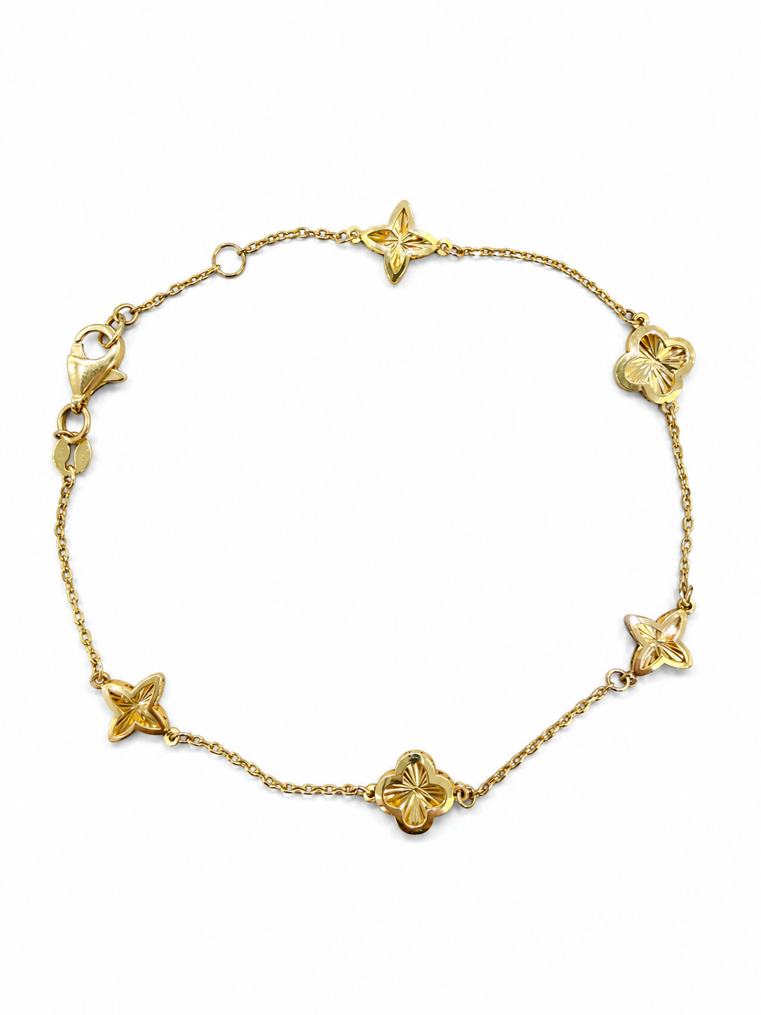 Pulsera con diseño de flor de cuatro puntas en oro de 14 kt