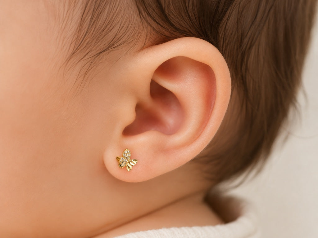 aretes pegados de mariposa con circonias 14k