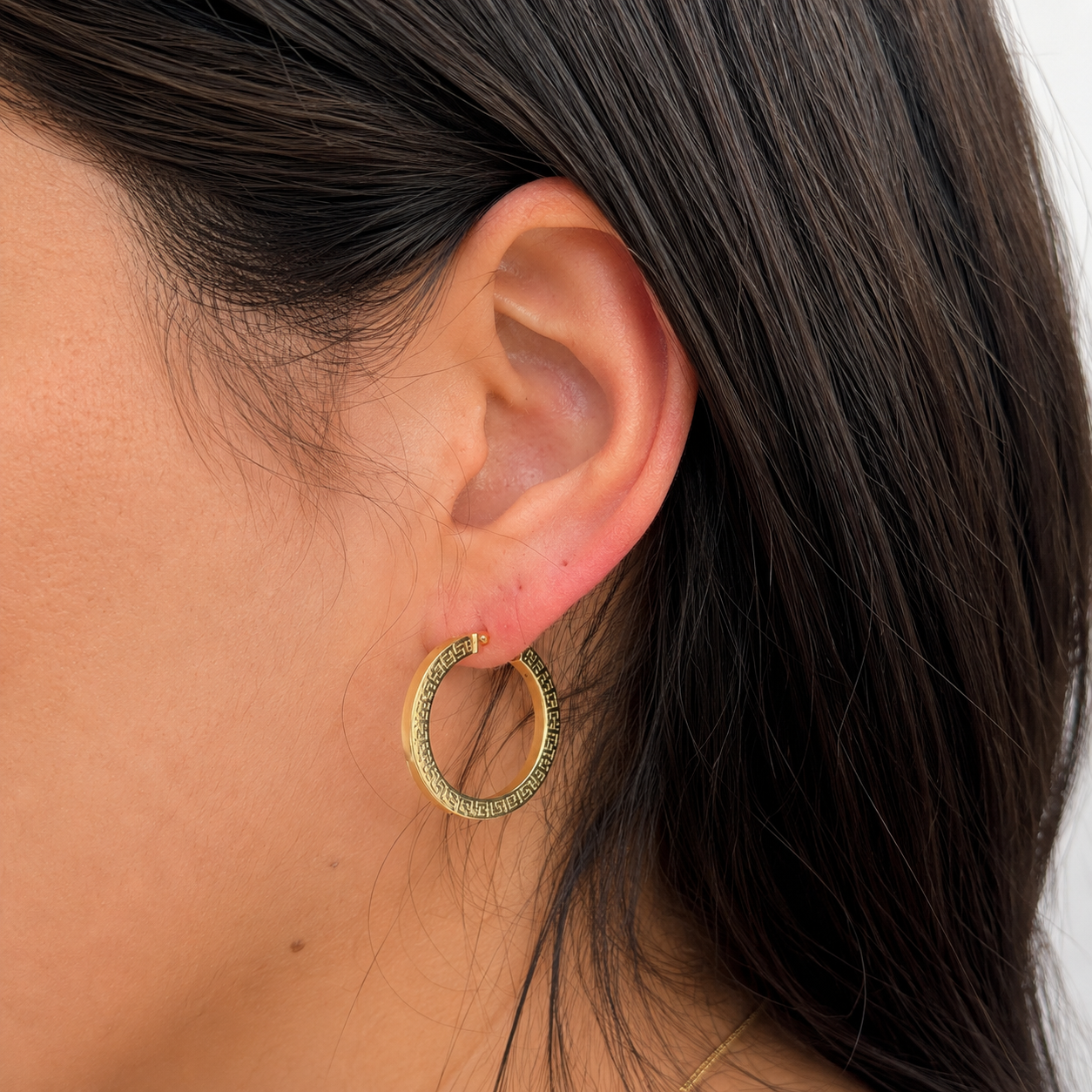 Argollas con diseño en oro 10 kt