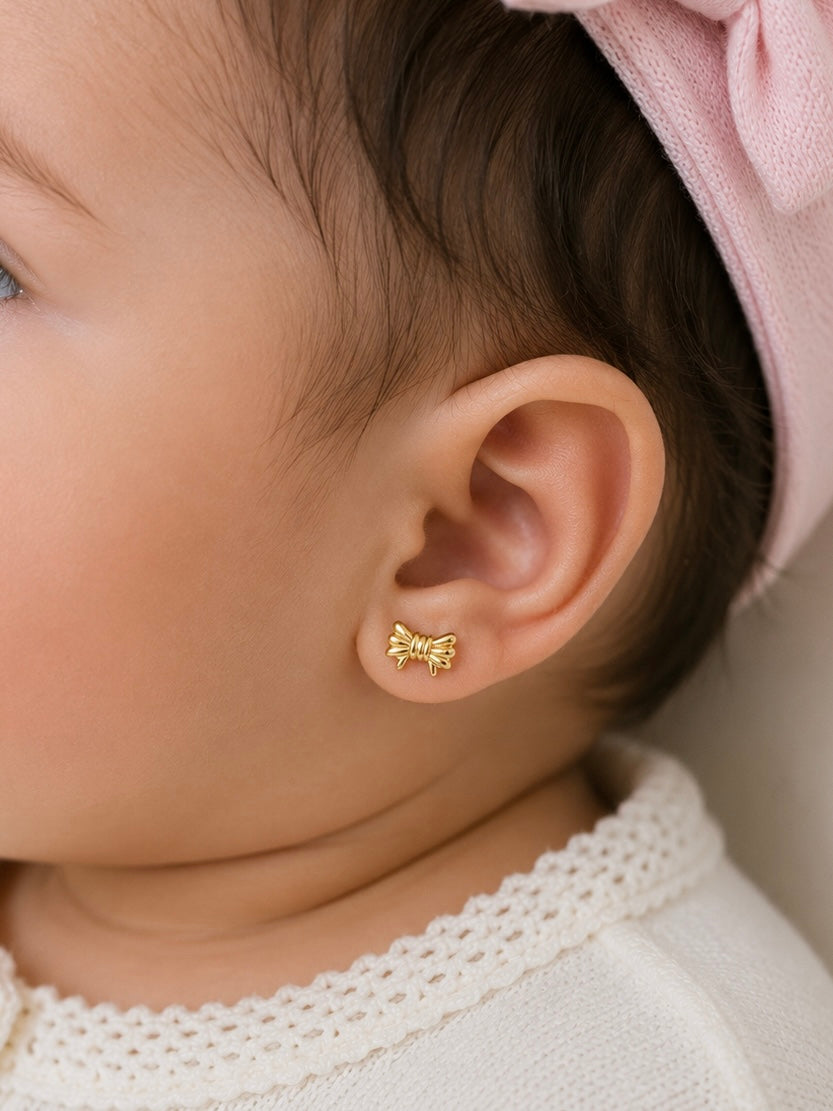 Aretes pegados de lazos 14k