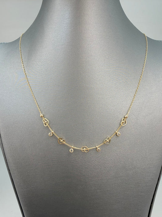 Cadena solida de corazones y circonias en oro de 14 kt