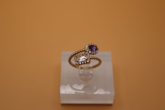 Anillo con zirconia blanca y morada