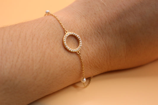 Pulsera de perlas y zirconia 14k