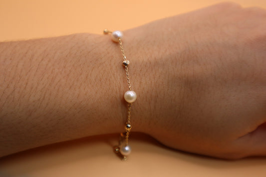 Pulsera de balines y perlas 14k