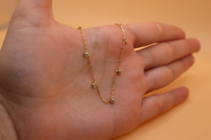 Pulsera de corazones colgando 14k