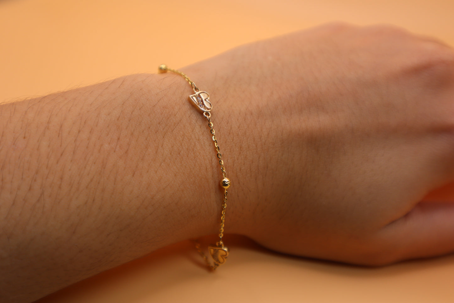 Pulsera de balines y corazones 14k