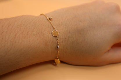 Pulsera de colgantes tres oros 14k