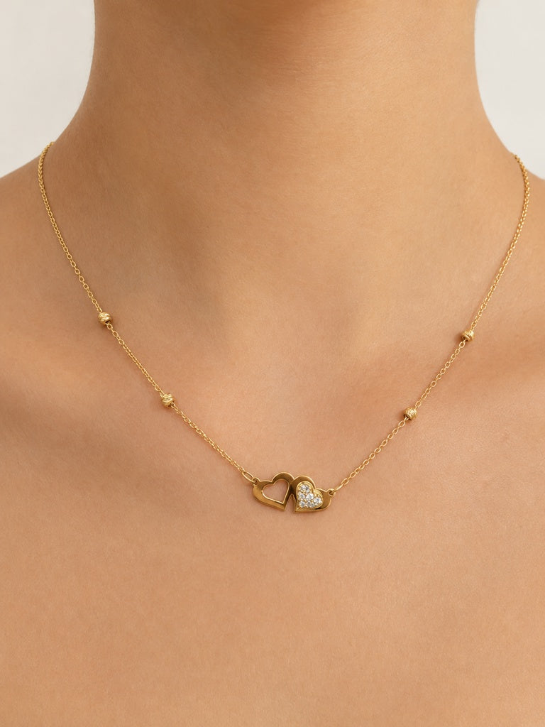 cadena fina con dos corazones y un corazon con circonia