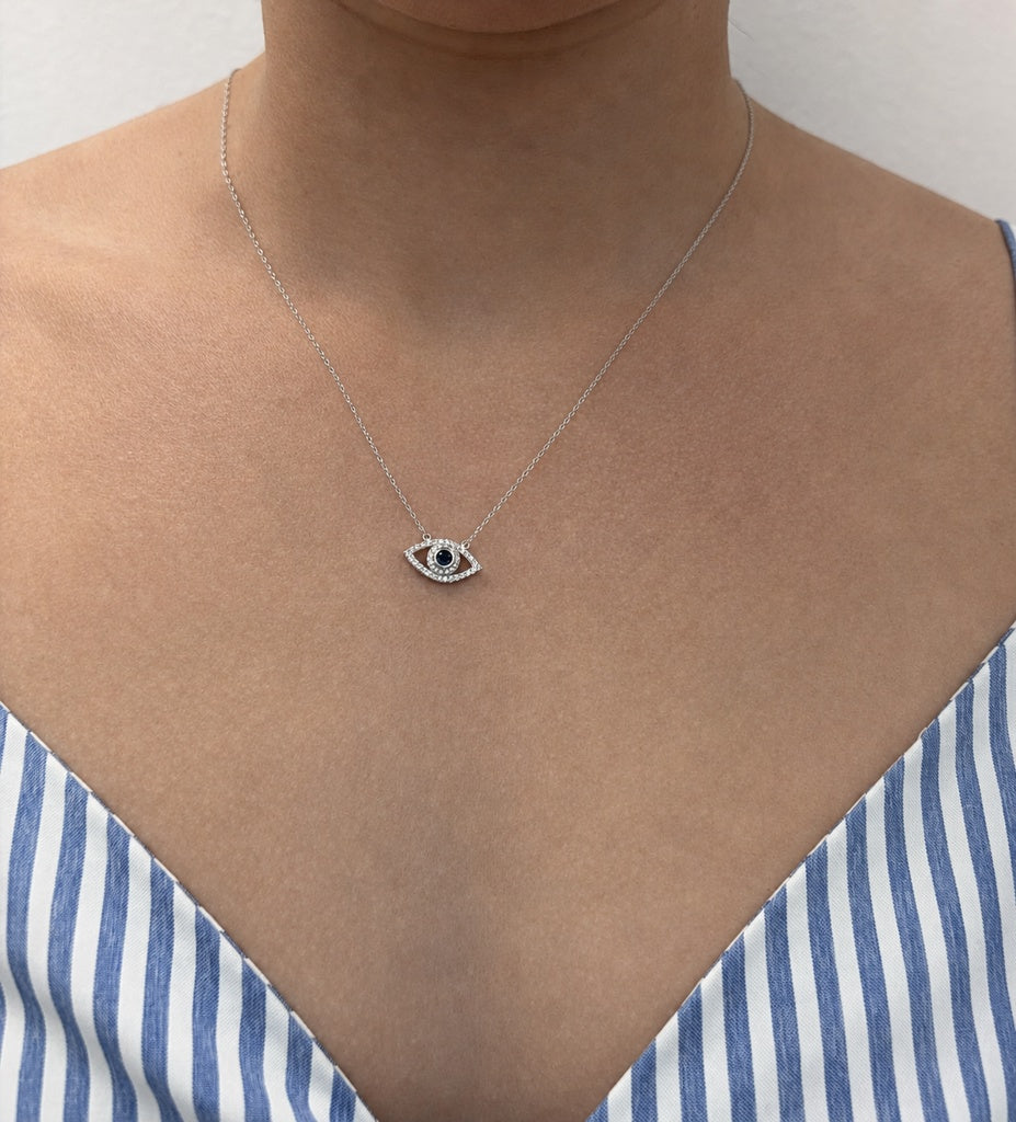 Cadena de oro blanco con ojo de circonias 14k